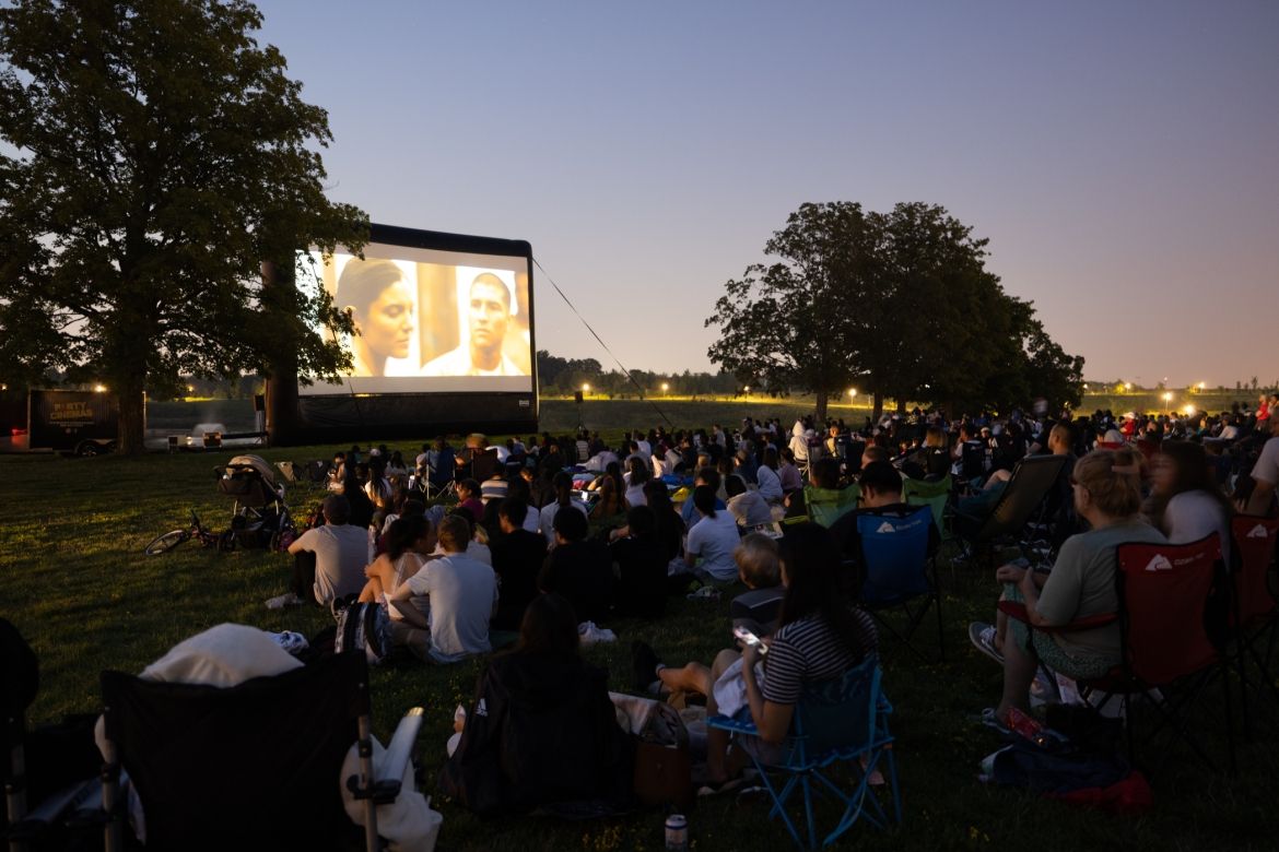 Crowd watching movie screen Crowd watching movie screen