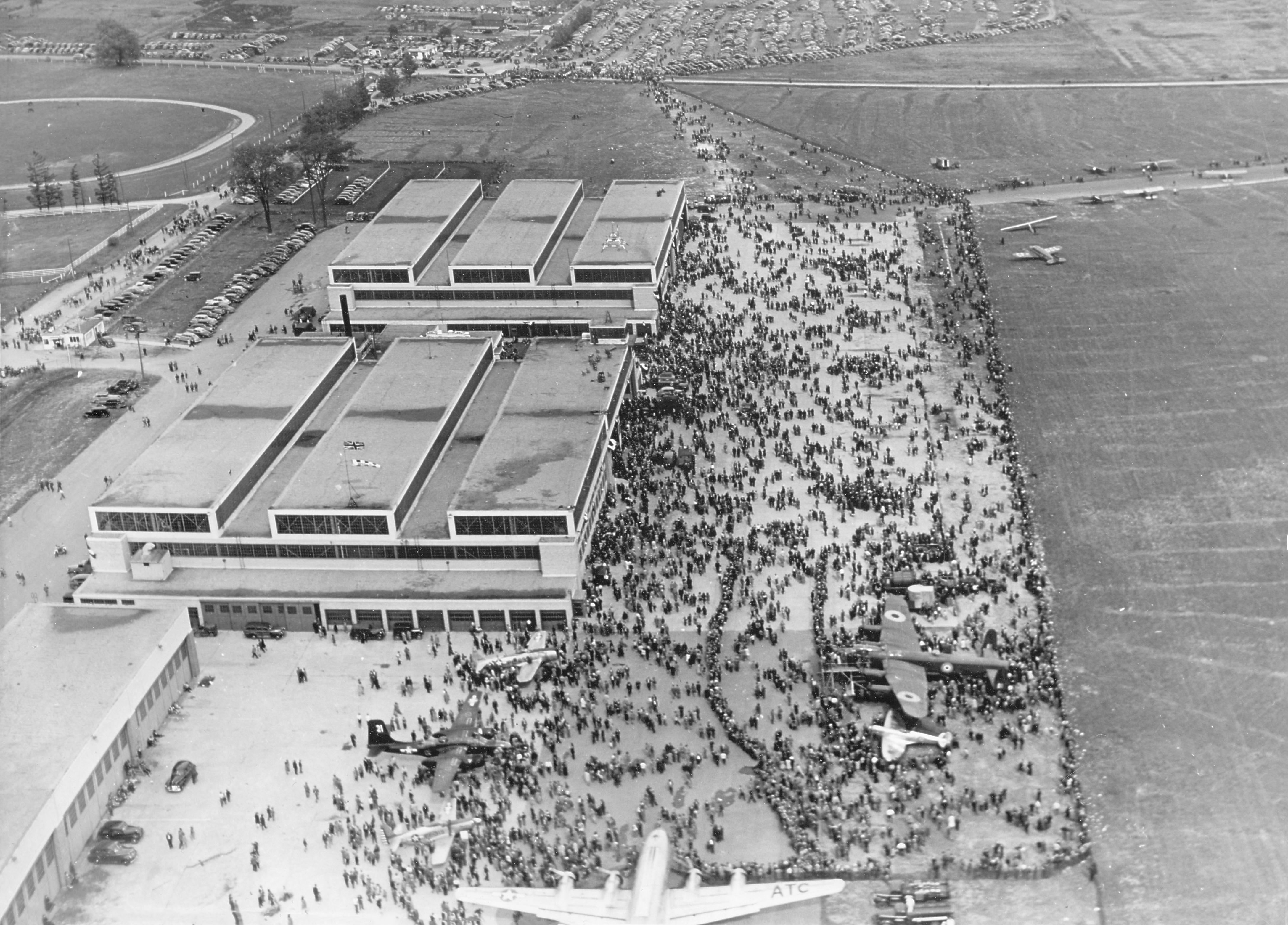 A black and white aerial photo of a crowd.