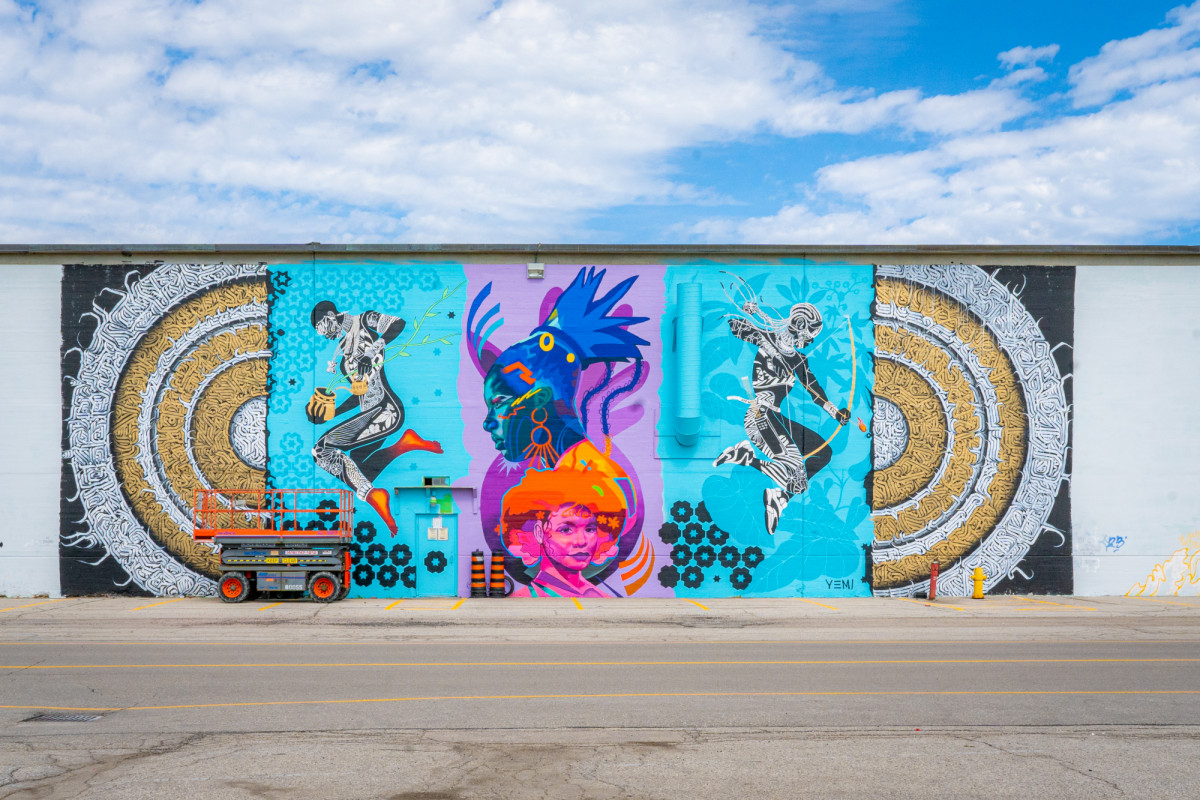 A colourful mural featuring the works of different artists.