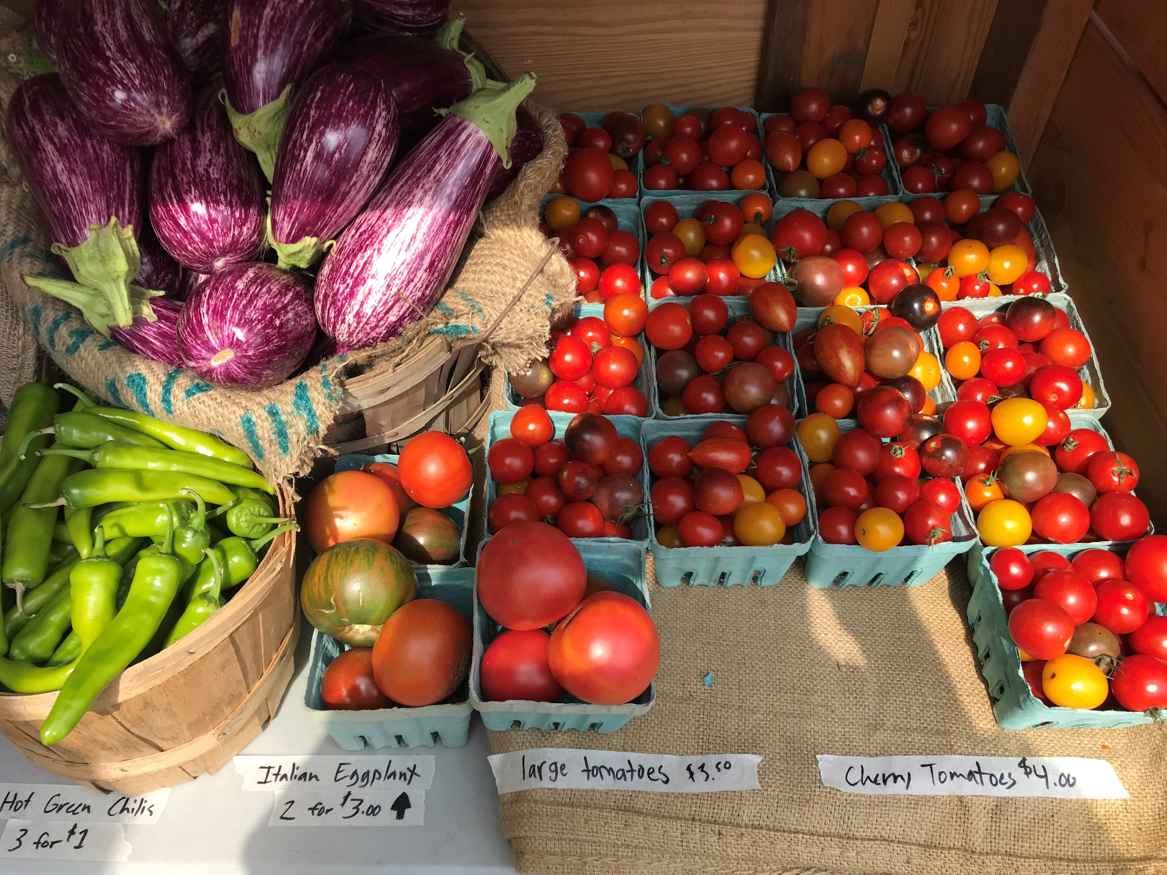 A variety of colourful fruits and vegetables for sale.