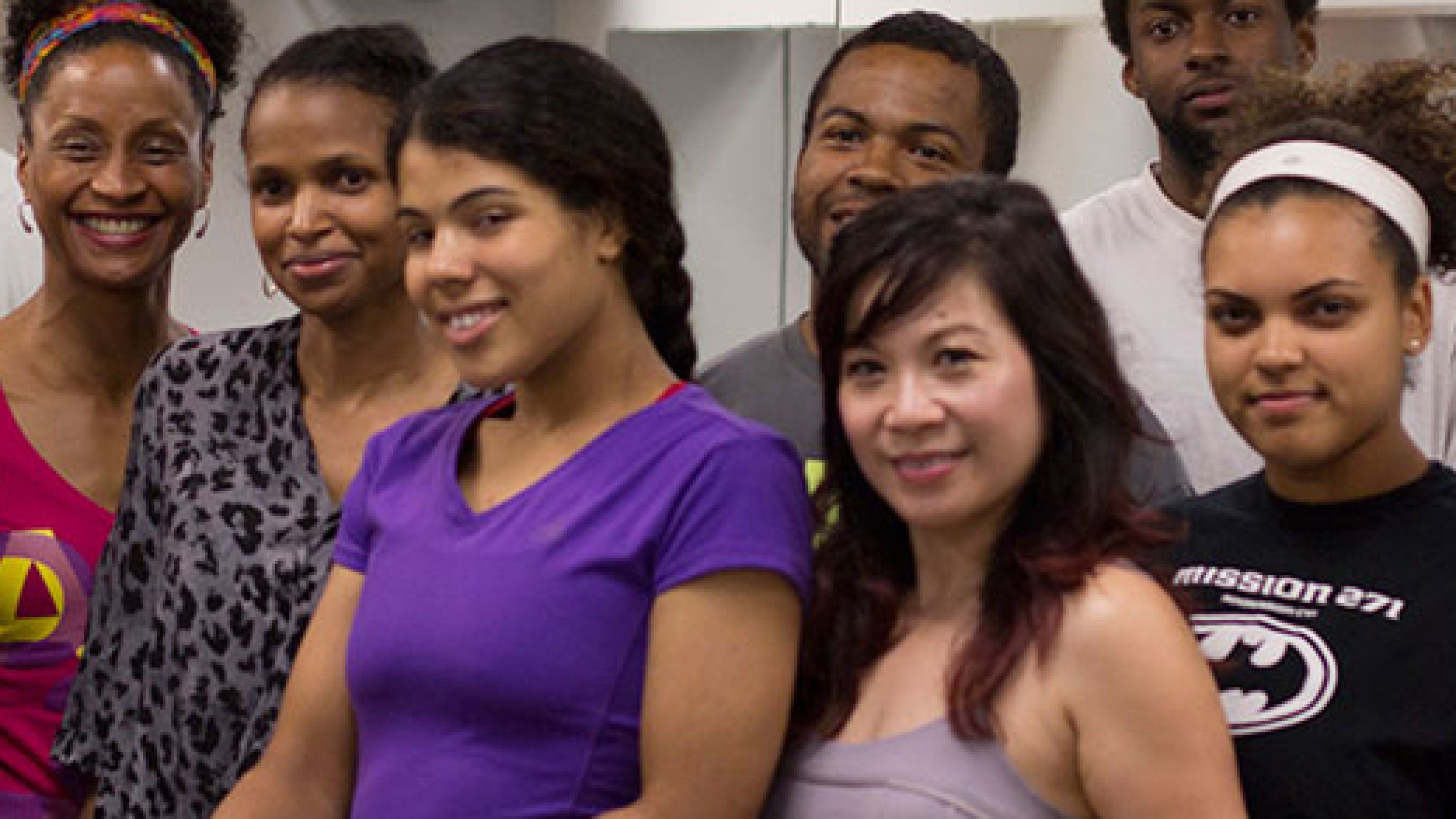 A group of people smiling for the camera.