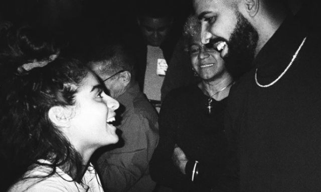 A black and white photo of Jessie Reyez and Drake.