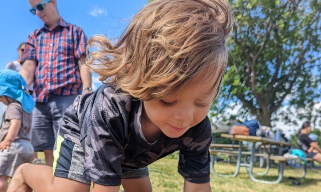 Toddler playing in the dirt