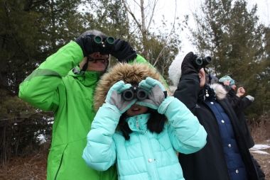 people with binoculars