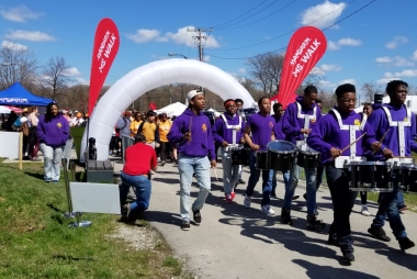 A group of people participating in the MS Walk at Downsview Park.