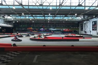 A large indoor go-karting facility.
