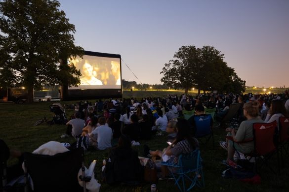 people watching a movie outdoors