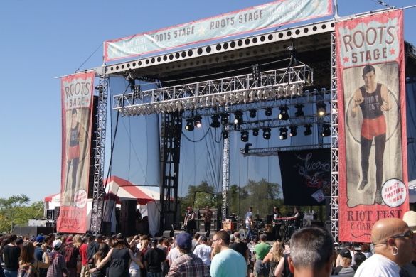 A large Riot Fest stage and a crowd of people.
