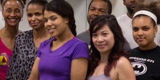 A group of people smiling for the camera.